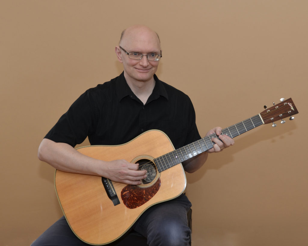 Mike posing with guitar